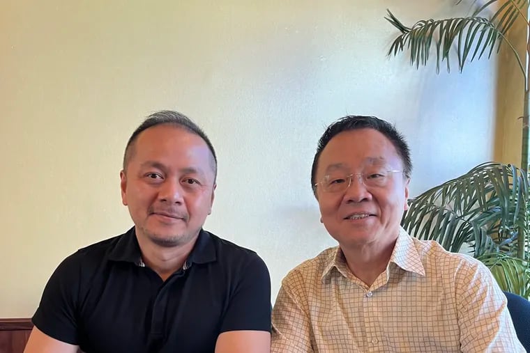 Dan Tsao (left) and Adam Wu came to the U.S. as students and have built businesses in Philadelphia's Chinatown. They say residents, businesses and nonprofits are setting up a committee to engage the Sixers arena developers so the project does not damage Chinatown but steers opportunities to the community