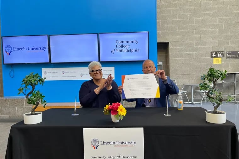 Brenda A. Allen (left), president of Lincoln University, and Donald Guy Generals, president of the Community College of Philadelphia, signing a partnership agreement to create a pathway for Lincoln grads into CCP's accelerated nursing program.