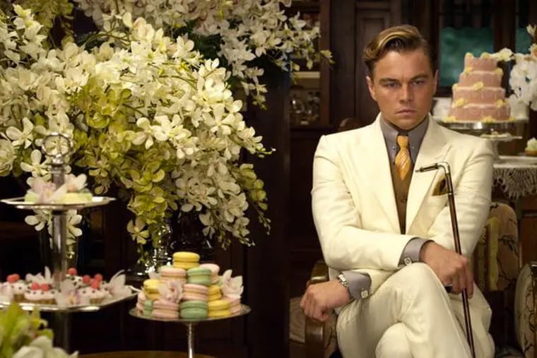 Leonardo DiCaprio plays the title character, a mysterious millionaire, in Baz Luhrmann's version of F. Scott Fitzgerald's &quot;The Great Gatsby,&quot; which opens Friday. Narrator Nick Carraway is played by Tobey Maguire. Warner Bros. Pictures