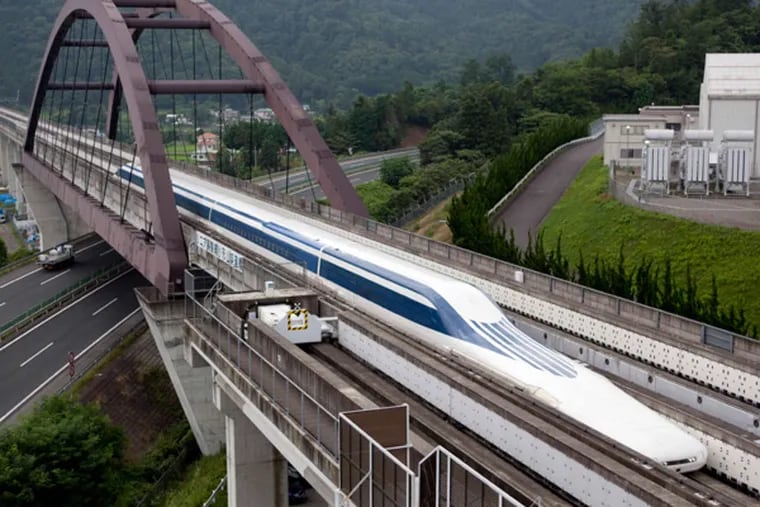 A magnetically levitated train crossing a bridge outside of Tokyo. (Northeast Maglev and Central Japan Railway Co.)
