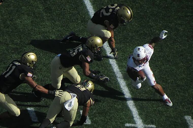 Temple's Mike Jones returns a punt against Army.