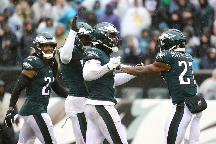 Haason Reddick #7 of the Philadelphia Eagles (center) celebrates with teammates against the Jacksonville Jaguars at Lincoln Financial Field on October 02, 2022 in Philadelphia, Pennsylvania. (Photo by Tim Nwachukwu/Getty Images)