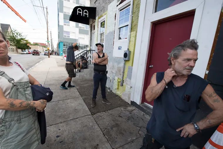 Robert Reif, right, Director of The Last Stop recovery house talks about the recent outbreak of drug overdoses in the Kensington neighborhood. Sunday, July 22, 2018.