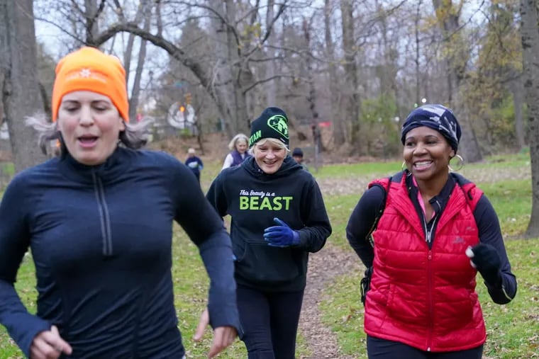 Gina Donato (left), Donna Biddle (center) and Yvonne Ferguson Hardin run together at Northwestern Stables in Philadelphia during their Saturday morning bootcamp class. Hardin writes that caregivers especially need outside activity and camaraderie to ward off feelings of depression and isolation.