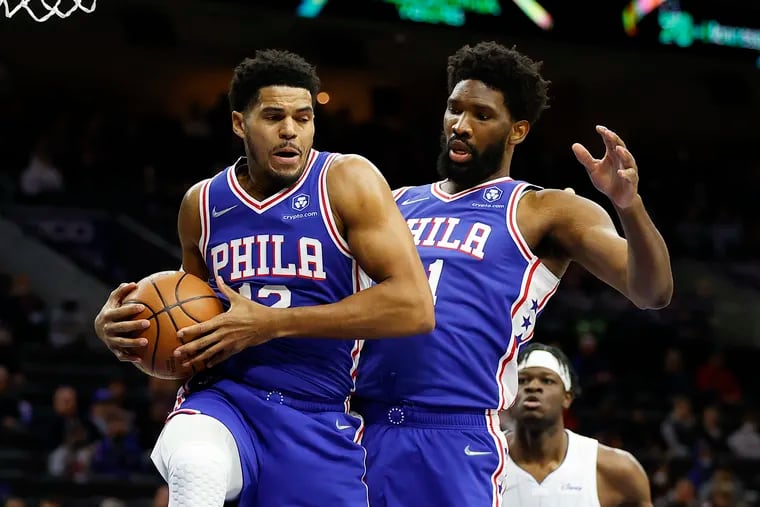 Sixers forward Tobias Harris (12) and Joel Embiid have missed a combined 15 games this season with COVID-19.