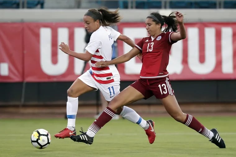 Mallory Pugh (left) missed the Tournament of Nations due to a knee injury suffered in late May.