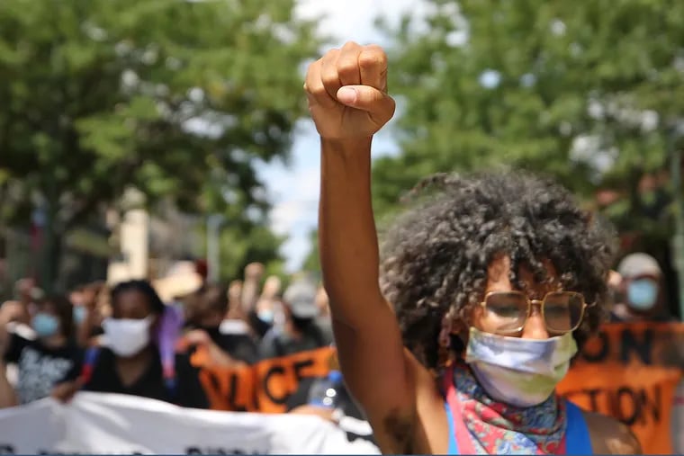 Samantha Rise, of Police Free Penn, leads a group of protesters to the University of Penn’s police department during a rally in Philadelphia on Sunday.