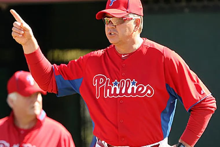 "I rely on Rich a lot," Phillies manager Charlie Manuel said of pitching coach Rich Dubee. (Yong Kim/Staff Photographer)