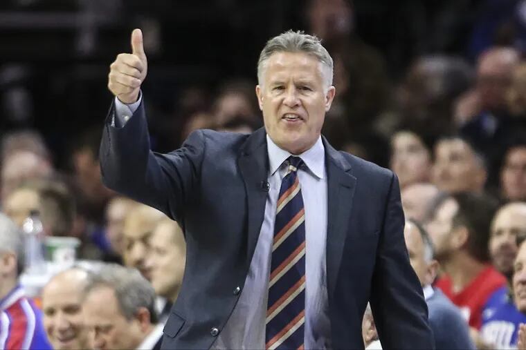 Sixers' head coach Brett Brown calls plays against the Heat during the 1st quarter of Game 2 of the 2018 Playoffs at the Wells Fargo Center in Philadelphia, Monday, April 16, 2018. STEVEN M. FALK / Staff Photographer
