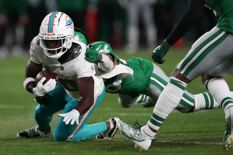 Philadelphia Eagles safety Terrell Edmunds brings down Miami Dolphins wide receiver Tyreek Hill in the second quarter at Lincoln Financial Field on Sunday, Oct. 22, 2023, in Philadelphia , PA.
