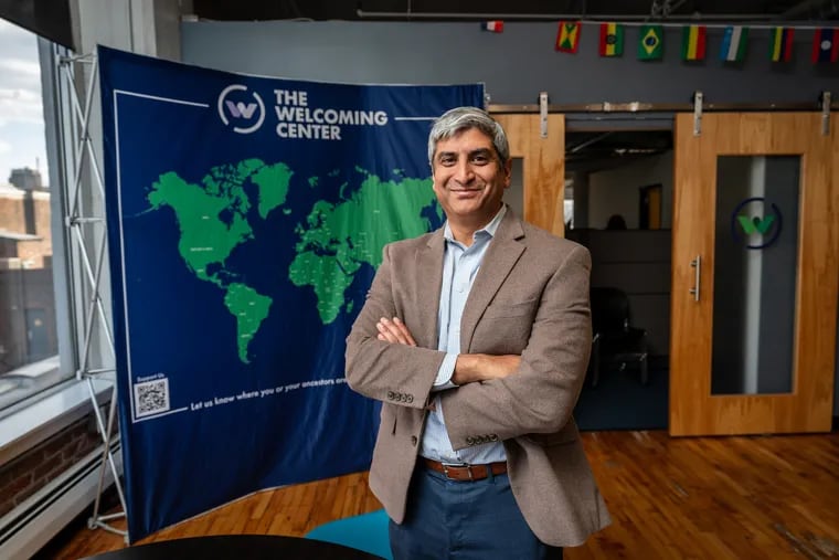 Anuj Gupta, president and CEO of the Welcoming Center, at its office in Philadelphia. The center's International Professionals Program helps new arrivals move toward jobs where the expertise acquired in their homelands can be put to the fullest and best use.