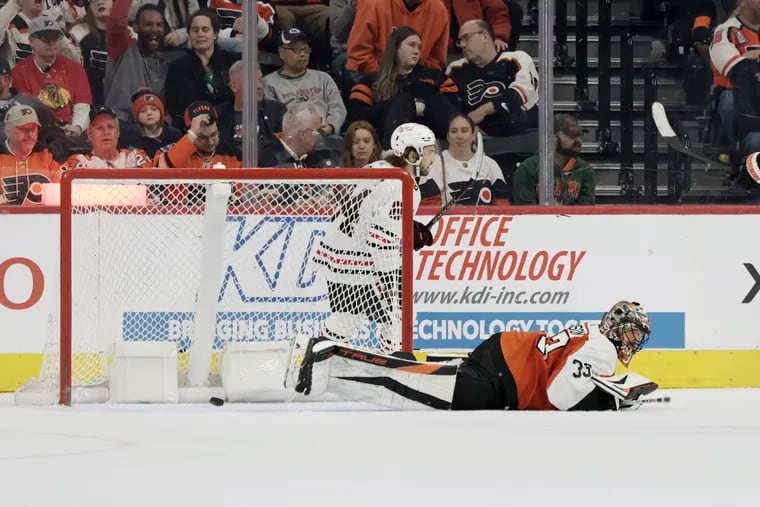 The Flyers' goaltending has let them down in recent weeks. Samuel Ersson reacts after allowing a goal.