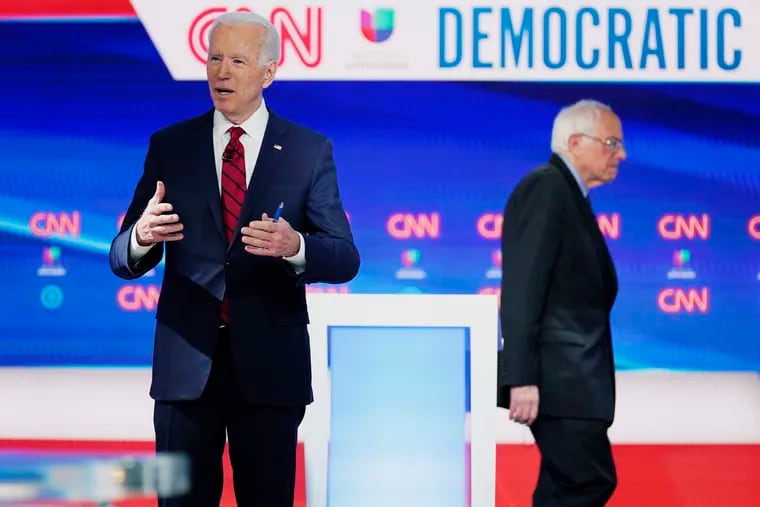 Sen. Bernie Sanders, I-Vt., and former Vice President Joe Biden, participate in a Democratic presidential primary debate in March.