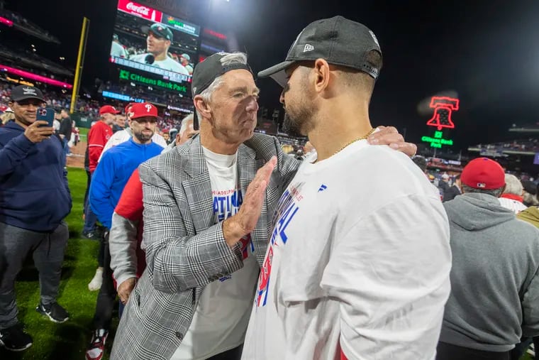 David Dombrowski (left), the Phillies' president of baseball operations, celebrates with Nick Castellanos after the team finished off the Padres in the National League Championship Series.