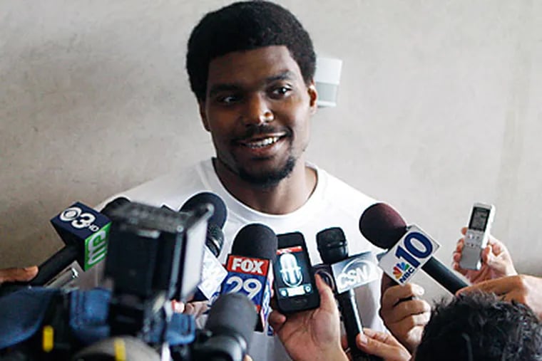New Sixer Andrew Bynum speaks to the media in Philadelphia. (AP Photo/Brynn Anderson)