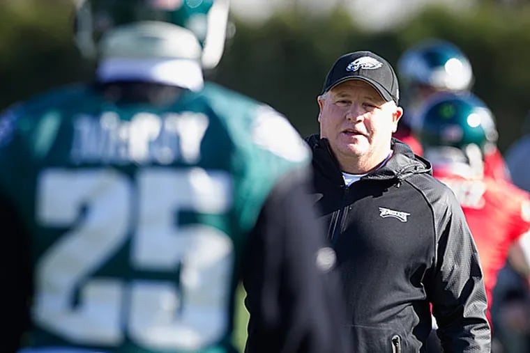 Eagles head coach Chip Kelly and running back LeSean McCoy. (Ed Hille/Staff Photographer)