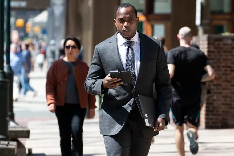 Former Philadelphia Treasurer Christian Dunbar arrives at the federal courthouse for his sentencing on Tuesday. Dunbar pleaded guilty to charges including immigration and tax fraud in October.