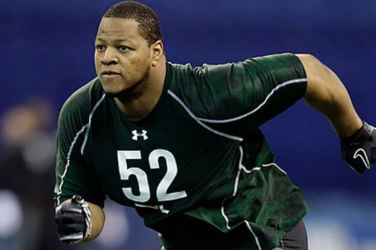 Nebraska defensive tackle Ndamukong Suh is one of the top prospects in this year's NFL draft. (Michael Conroy/AP file photo)