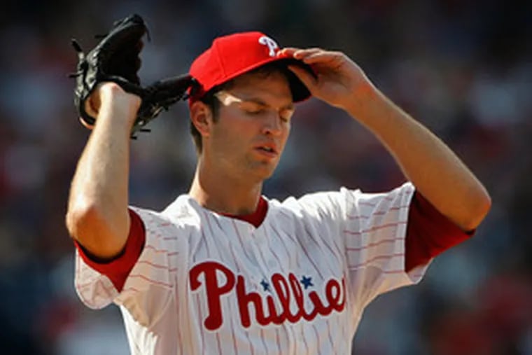 The Phils&#0039; J.A. Happ endures his brief debut after Carlos Beltran&#0039;s homer. He never made it out of the fifth inning and was sent back to the minors.