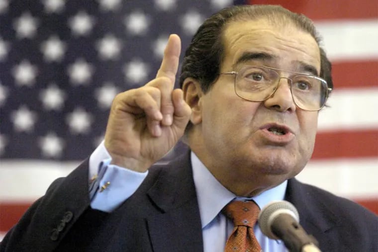 U.S. Supreme Court Justice Antonin Scalia speaks to Presbyterian Christian High School students in Hattiesburg, Miss. On Saturday, Feb. 13, 2016, the U.S. Marshall's Service confirmed that Scalia has died at the age of 79. (File/Gavin Averill/The Hattiesburg American via AP)