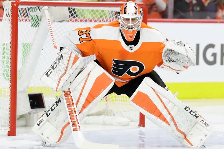Flyers goaltender Brian Elliott in front of his goal against the Pittsburgh Penguins in game three of the Eastern Conference quarterfinal playoffs on Sunday, April 15, 2018 in Philadelphia. YONG KIM / Staff Photographer