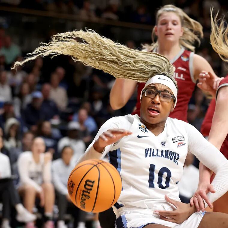 Christina Dalce, left, of Villanova and Chloe Welch of St. Joseph's have ahard fall after battling for a rebound in the 2nd half of a quarterfinal WBIT game on March 28, 2024 at the Finneran Pavilion at Villanova University.