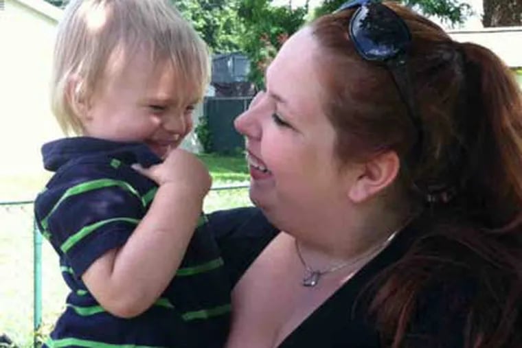 Lynn Heinsich of Croydon, with son Liam, was a target of Facebook's fight against offensive pictures.