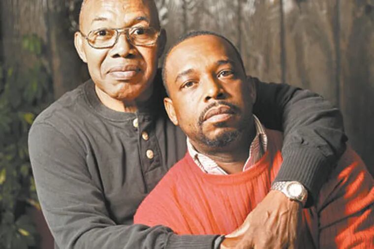 Raymond Davis, left, is the father of Leonard Porter, right, and today he took his son to dialysis for the first time. Leonard will need the help and support of his family to live through this ordeal of kidney failure. ( Michael Bryant / Staff Photographer )