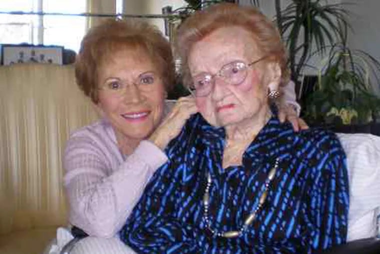 Fannie Buten celebrating her 111th birthday in February with daughter Marjorie Steinberg.