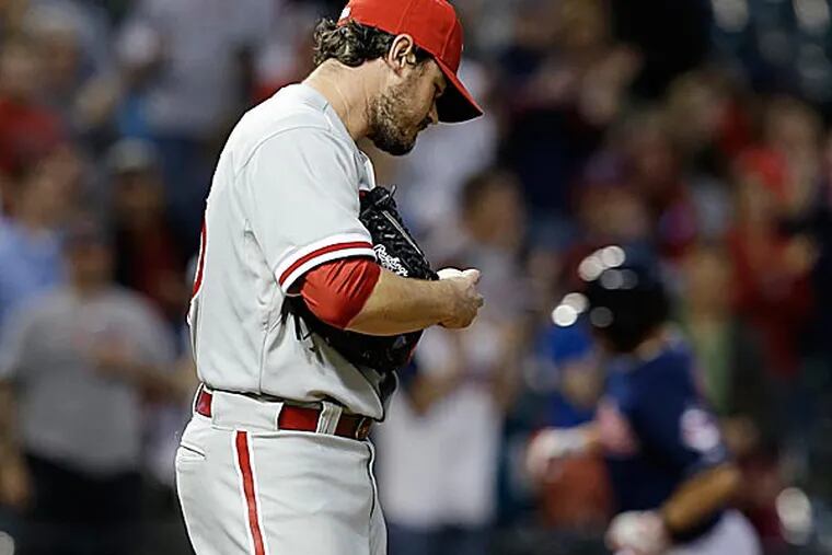 Phillies relief pitcher Chad Durbin waits for the Indians' Ryan Raburn to run the bases after Raburn hit a two-run home run in the fifth inning. (Tony Dejak/AP)