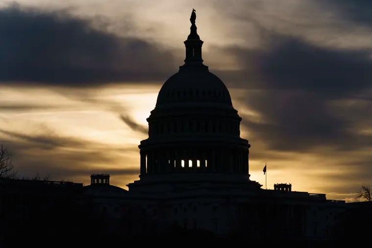 The Capitol is seen in Washington, early Friday, after President Joe Biden said he was unable to come to an agreement with Sen. Joe Manchin (D., W.Va.), a centrist Democrat vital to the fate of the Democrats' expansive social and environment bill.