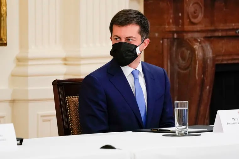 Secretary of Transportation Pete Buttigieg attends a cabinet meeting with President Joe Biden in the East Room of the White House, Thursday, April 1, 2021, in Washington.