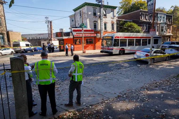 SEPTA officials at the scene of a fatal shooting of bus driver Bernard N. Gribbin on Oct. 26.