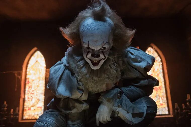 This image released by Warner Bros. Pictures shows Bill Skarsgard in a scene from “It.”