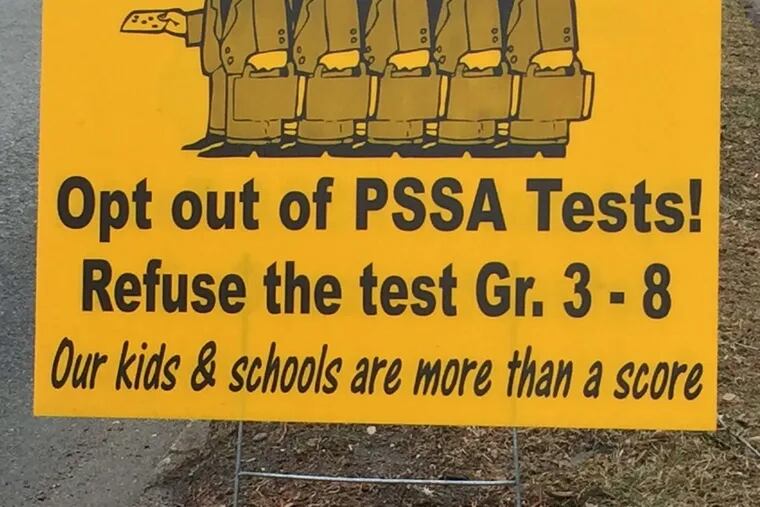 A sign urges parents to forego the Pennsylvania System of School Assessment tests for their children.