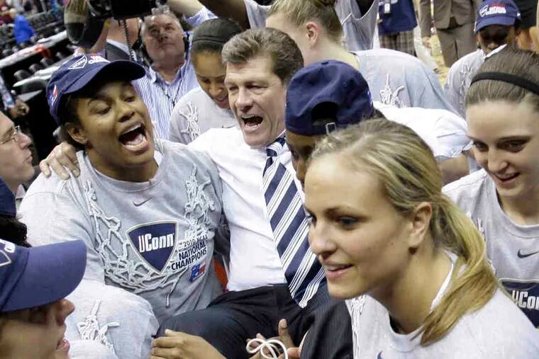 Geno Auriemma is carried off the floor by his players after Connecticut won the 2010 NCAA championship in April, defeating Stanford.