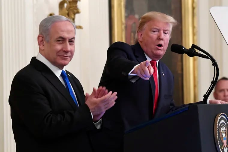 President Donald Trump speaks during an event with Israeli Prime Minister Benjamin Netanyahu in the East Room of the White House in Washington, Tuesday, Jan. 28, 2020.