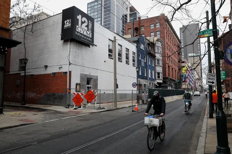 The wall of the former 12th Street Gym, which held a mural of Latina LGBTQ activist Gloria Casarez, is pictured in Center City Philadelphia on Thursday, Dec. 24, 2020. The mural was painted over without notice as part of a developer's plan to raze the building.