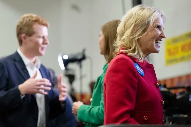 Kerry Kennedy (right) and Joe Kennedy III conduct interviews ahead of their endorsement of President Joe Biden at Martin Luther King Recreation Center in Philadelphia Thursday.