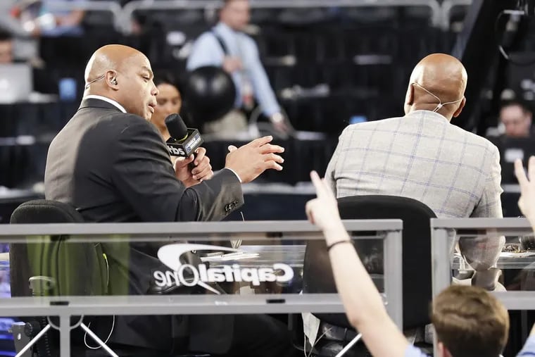 TNT basketball analyst and former NBA player Charles Barkley talks to colleague Kenny Smith before Villanova played Kansas in the NCAA Basketball Championship semifinals game on Saturday, March 31, 2018 at the Alamodome in San Antonio.