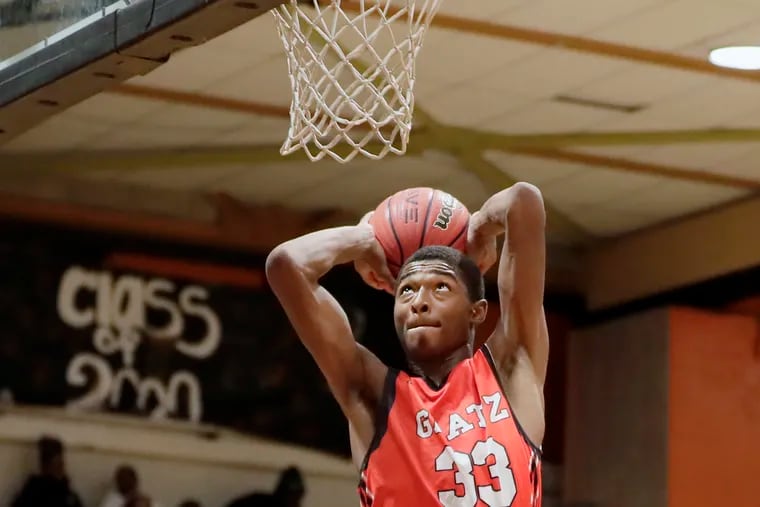 Simon Gratz High's Ross Carter, shown here about to dunk in a Dec. 20, 2019, game vs. Camden, was shot and killed on Friday, Sept. 25, 2020, according to Gratz coach Lynard Stewart.