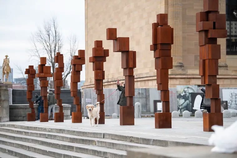 Antony Gormley's 'STAND' sculptures will stand atop the Rocky steps through June 16.