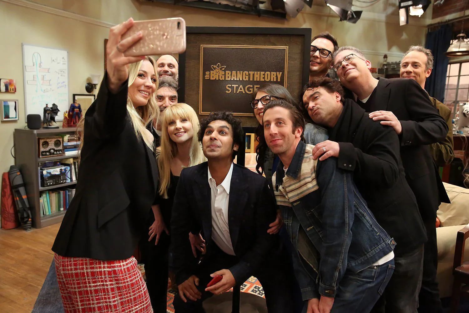 Cast members and producers of CBS's "The Big Bang Theory" took a selfie on the show's Warner Bros. set in February, when the stage that's been home to the record-breaking comedy was renamed in its honor. From left: star Kaley Cuoco, executive producers Steven Molaro and Chuck Lorre; stars Melissa Rauch, Kunal Nayyar, Mayim Bialik, Simon Helberg, Johnny Galecki, and Jim Parsons; executive producer Bill Prady;  star Kevin Sussman.