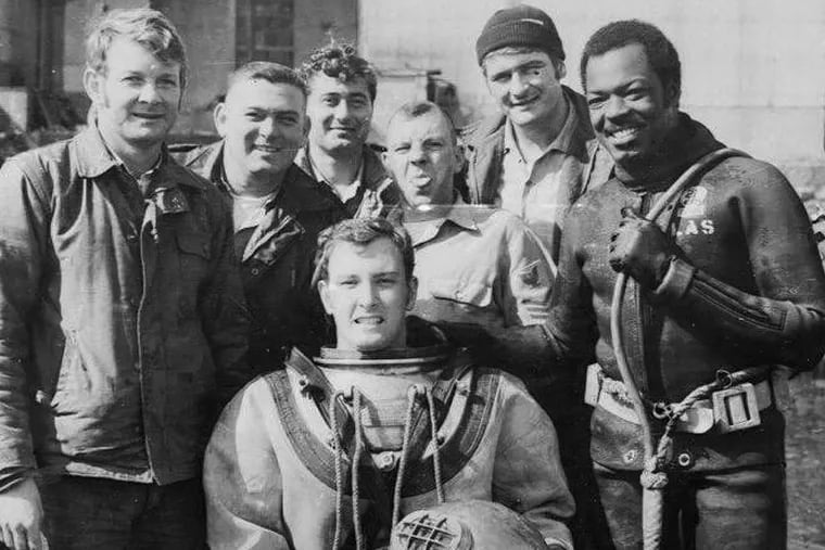 Mr. Summers (far right) was a member of the Navy Seals during the Vietnam War.