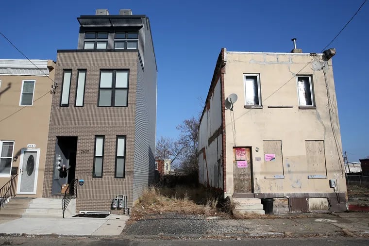 On the 2600 block of West Jefferson Street in Philadelphia, a newly constructed rowhouse has risen just feet from one in disrepair. Housing advocates are calling for developers to maintain the housing stock we have.