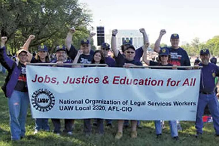 Members of UAW Local 2320 in New York, nearly half of whom are lawyers, voted to strike this month, after their employer, Legal Services NYC, pushed for cuts to benefits in a recent contract negotiation. (Photo from UAW.org)