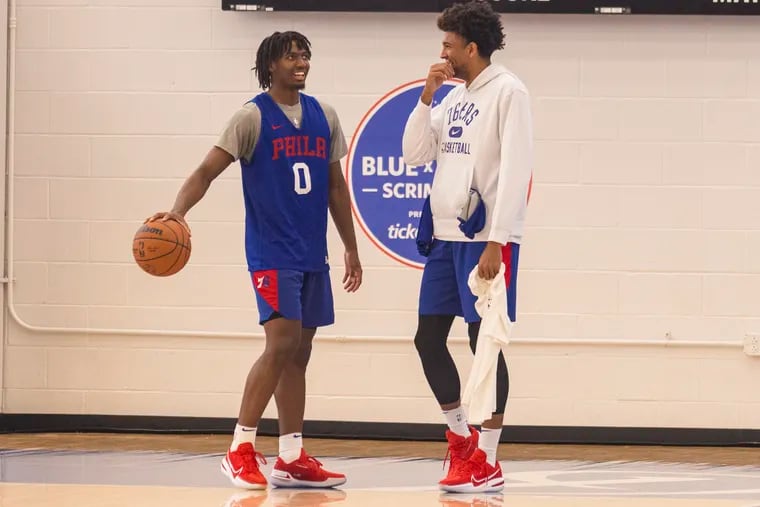 Sixers guards Tyrese Maxey and Matisse Thybulle chat before the scrimmage amongst teammates at the Chase Field House in Wilmington, Del., on Saturday, Oct. 9, 2021.