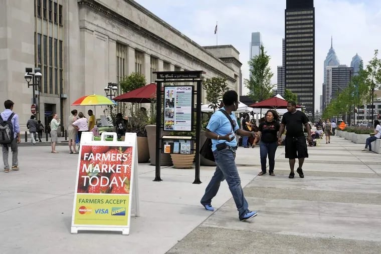 Once a congested parking lane and sidewalk, the Porch at 30th Street Station now has landscaping, seating, performances, yoga classes, and a Farmer&#039;s Market May 16, 2012 on Wednesdays including bakeries, fresh fruit, cut flowers, organic produce, gourmet popsicles, confections, and hummus. ( TOM GRALISH / Staff Photographer )