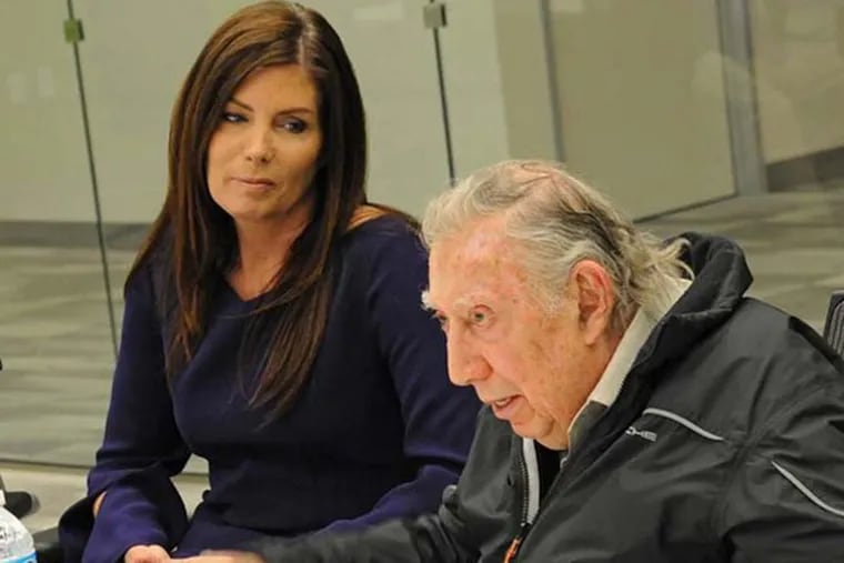Pennsylvania Attorney General Kathleen Kane listens to attorney Richard A. Sprague during a meeting with Inquirer editors and reporters, Thursday, March 20, 2013. He said he had advised her not to speak. (CLEM MURRAY/Staff Photographer)