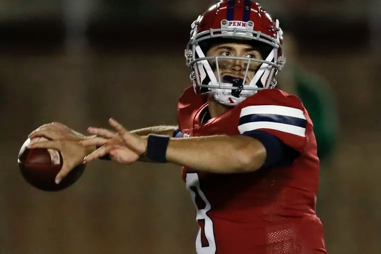 Penn quarterback Nick Robinson threw for 395 yards and three touchdowns against Yale.